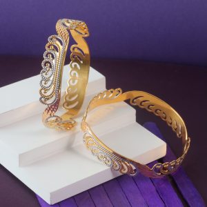 Meta Title (60 characters): Amara Swirl CNC Gold Bangles – Precision and Timeless Elegance